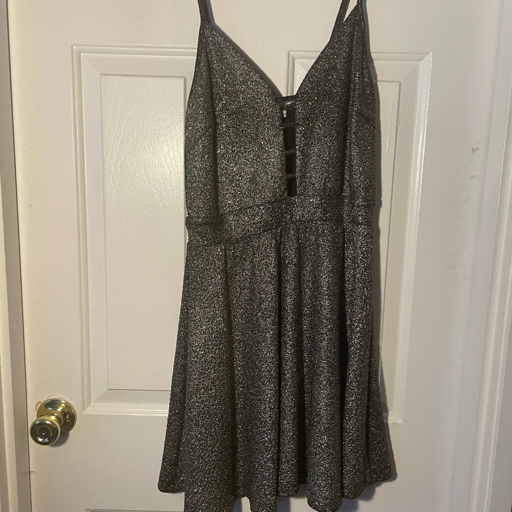 Black party dress with gold sparkles